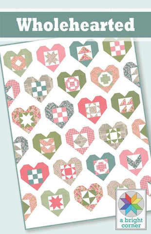 Image of the Wholehearted quilt pattern by Andy Knowlton for Riley Blake Designs. Features a quilt with hearts on a white background. 
Cute Little Fabric Shop