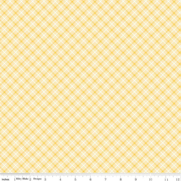 Image of the Bundle of Joy Plaid Yellow quilting cotton fabric by Doodlebug Design Inc for Riley Blake Designs. Features diagonal yellow plaid on a light yellow background. 
Cute Little Fabric Shop