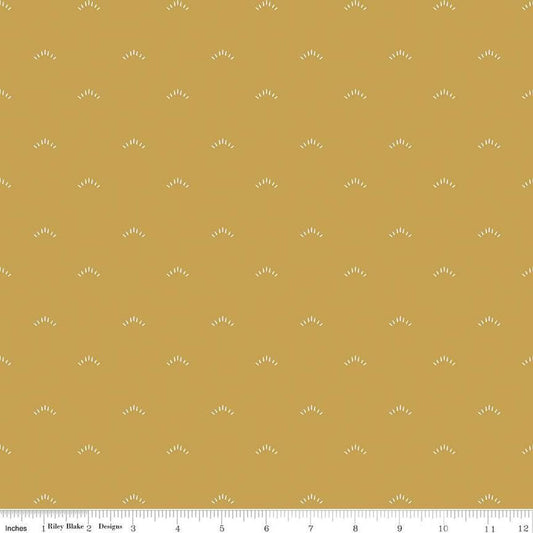 Image of the Garden Dreams Shimmer Gold quilting cotton fabric by Amber Elliot for Riley Blake Designs. Features eyelash shapes scattered on a light gold background. 
Cute Little Fabric Shop