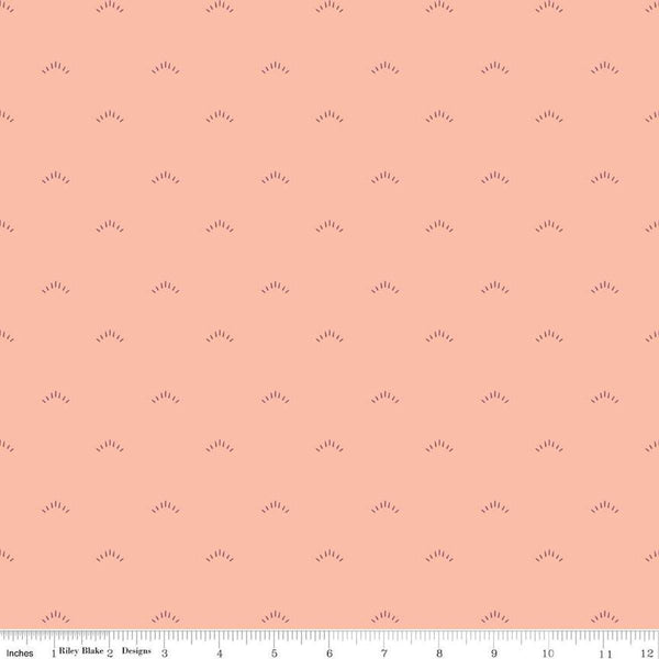 Image of the Garden Dreams Shimmer Peaches &#39;n Cream quilting cotton fabric by Amber Elliot for Riley Blake Designs. Features eyelash shapes scattered on a light pink coral background. 
Cute Little Fabric Shop