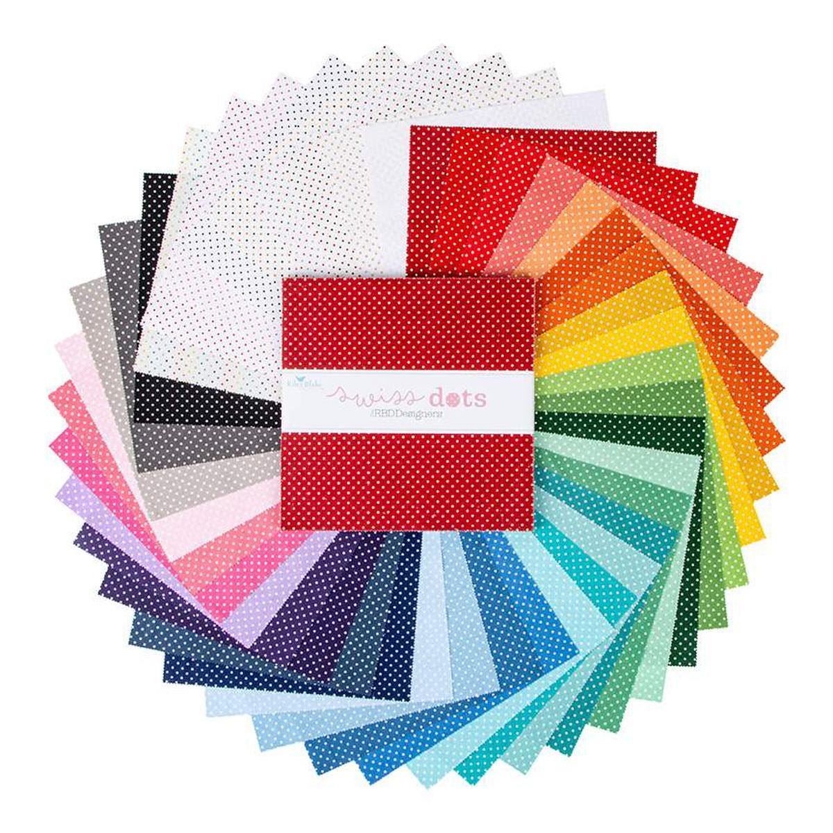 Image of the Swiss Dot 10" Stacker by Riley Blake Designs. Features dots on various backgrounds. 
Cute Little Fabric Shop