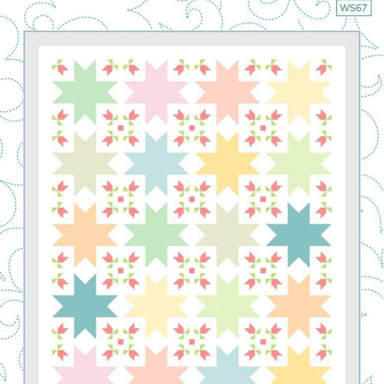 Image of the Cordelia Quilt Pattern by Wendy Sheppard for Riley Blake Designs. Features star patterns with flowers. 
Cute Little Fabric Shop