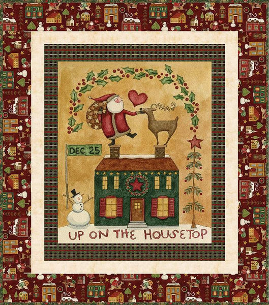 Image of the Up on the Housetop Panel Boxed Quilt Kit by Teresa Kogut for Riley Blake Designs. Features Santa on a rooftop with a red border. 
Cute Little Fabric Shop