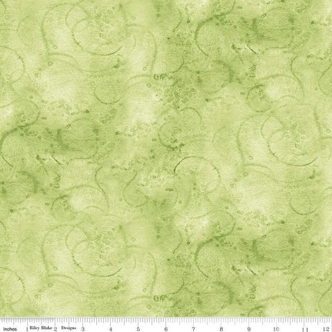 Image of the Painters Watercolor Swirl Pear quilting cotton fabric by J. Wecker Frisch for Riley Blake Designs. Features an abstract swirl watercolor design in light yellow green. 
Cute Little Fabric Shop