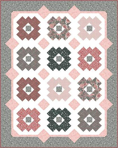 Image of the Daisy Patch quilt pattern by It&#39;s Sew Emma for Riley Blake Designs. Features a quilt with pink and grey fabrics. 
Cute Little Fabric Shop