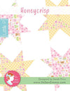 Image of the Honeycrisp quilt pattern by Its Sew Emma for Riley Blake Designs. Features a baby quilt with star designs. 
Cute Little Fabric Shop
