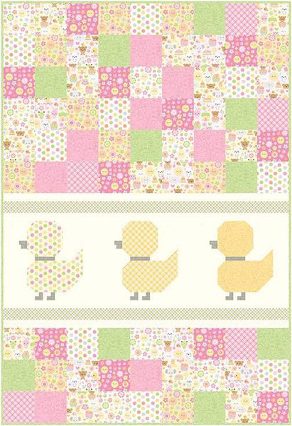 Image of the Duckling, Duckling, Go Quilt pattern by Wendy Sheppard for Riley Blake Designs. Features little ducklings with yellow, white, and yellow squares. 
Cute Little Fabric Shop