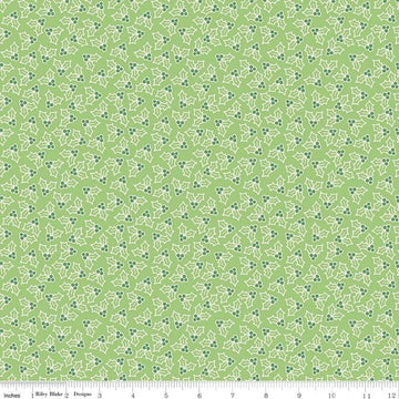 Image of the Cozy Christmas Holly Green fabric by Riley Blake Designs. Features tossed holly and berries. 
Cute Little Fabric Shop