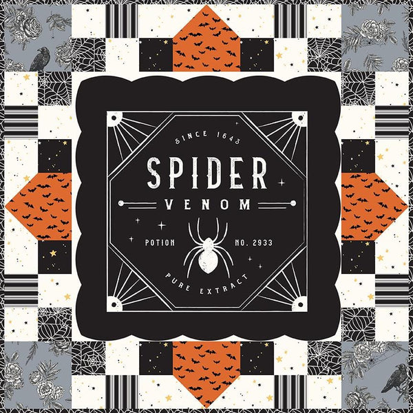 Image of the pillow kit from the Sophisticated Halloween pillow kit from Riley Blake Designs. Features a spider with halloween fabric around it. 
Cute Little Fabric Shop