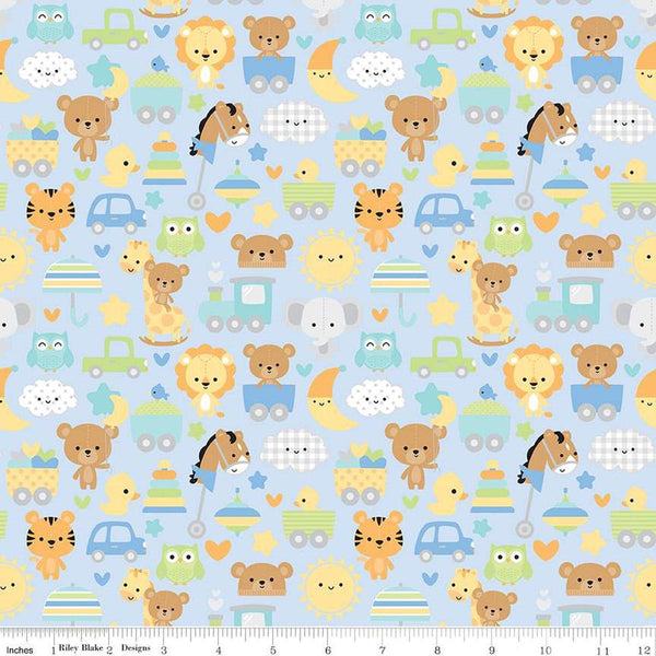 Image of the Special Delivery Main Blue quilting cotton fabric by Doodlebug Design Inc for Riley Blake Designs. Features baby-themed icons such as bunnies, clouds, toys, bears, moon, and elephants on a blue background. 
Cute Little Fabric Shop