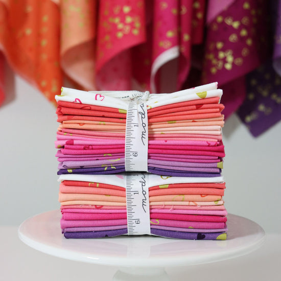 Image of the I Heart Ombre Metallic Fat Quarter Bundle by Moda Fabrics. Features 11 pieces from the collection, with pink and orange and white fabrics.
Cute Little Fabric Shop
