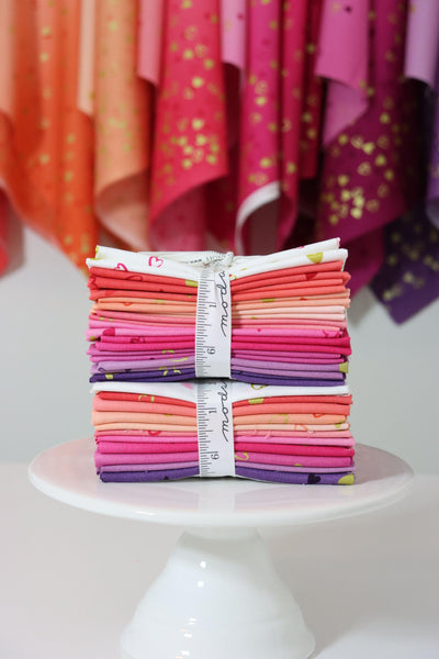 Image of the I Heart Ombre Metallic Fat Quarter Bundle by Moda Fabrics. Features 11 pieces from the collection, with pink and orange and white fabrics.
Cute Little Fabric Shop