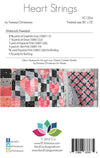 Image of the Heart Strings quilt pattern by Moda Fabrics. Features 4 different styles of a quilt pattern with hearts and the fabric requirements. 
Cute Little Fabric Shop