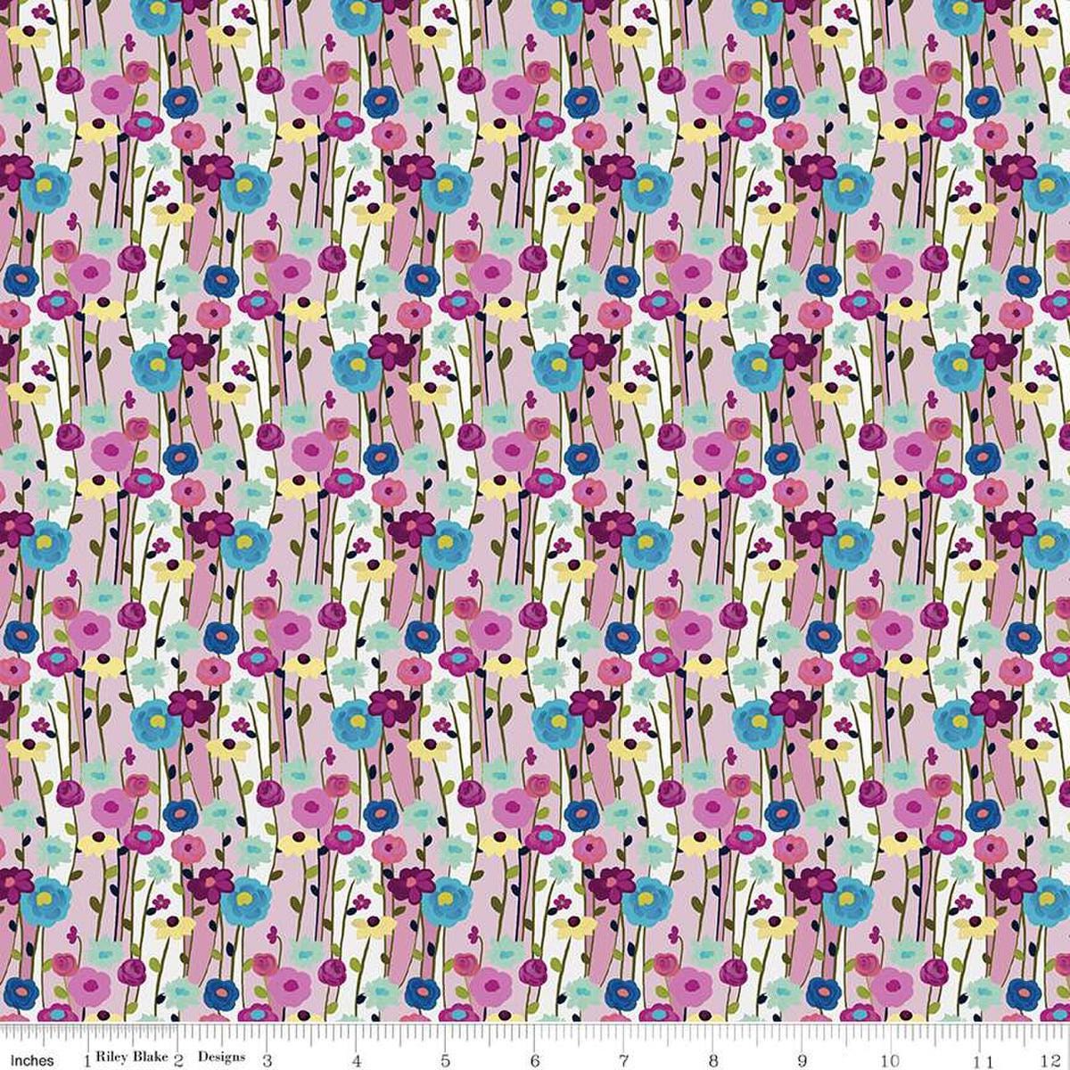 Image of the Fragrant Fields Flowers Lilac quilting cotton fabric by Lila Tueller for Riley Blake Designs. Features flowers on a light purple background. 
Cute Little Fabric Shop