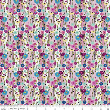 Image of the Fragrant Fields Flowers Lilac quilting cotton fabric by Lila Tueller for Riley Blake Designs. Features flowers on a light purple background. 
Cute Little Fabric Shop