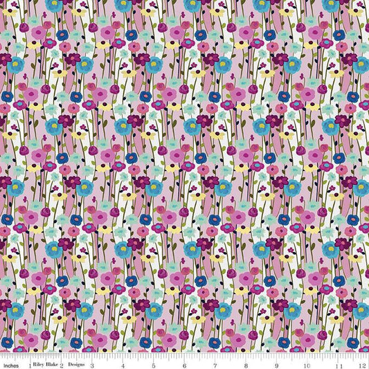 Image of the Fragrant Fields Flowers Lilac quilting cotton fabric by Lila Tueller for Riley Blake Designs. Features flowers on a light purple background. 
Cute Little Fabric Shop