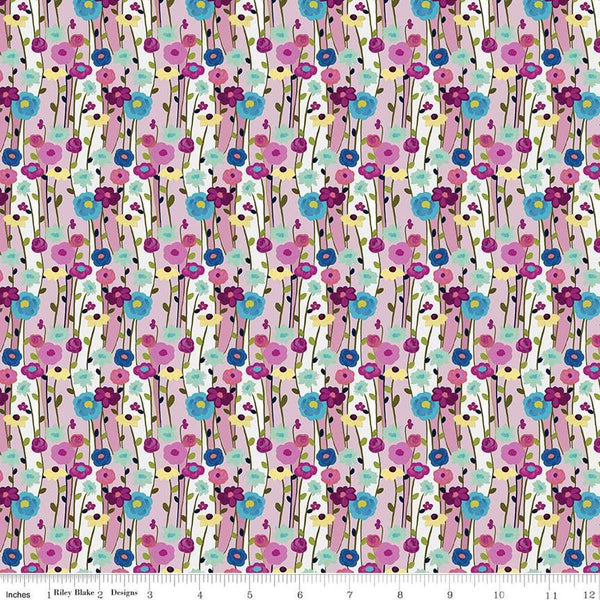 Image of the Fragrant Fields Flowers Lilac quilting cotton fabric by Lila Tueller for Riley Blake Designs. Features flowers on a light purple background. 
Cute Little Fabric Shop