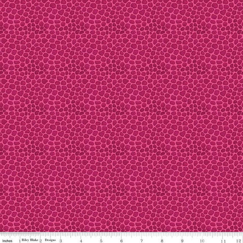 Image of the Fragrant Fields Stony Path Hot Pink quilting cotton fabric by Lila Tueller for Riley Blake Designs. Features small tone on tone stones on a dark pink background. 
Cute Little Fabric Shop