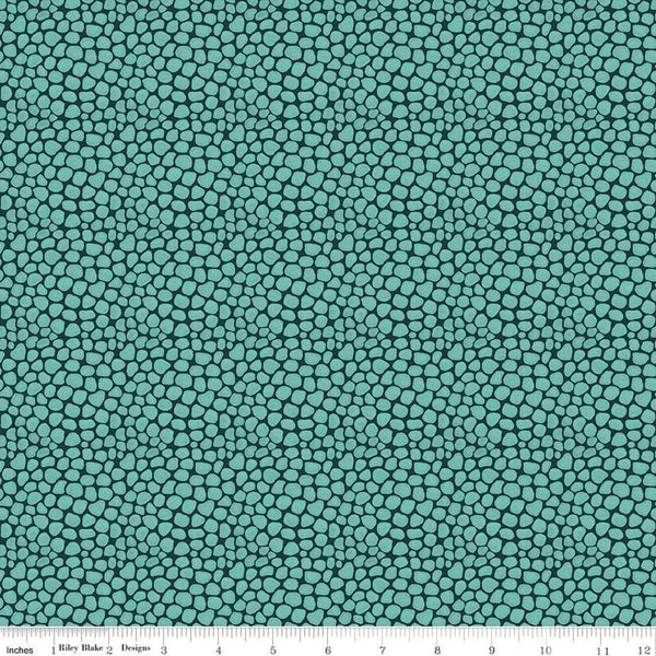 Image of the Fragrant Fields Stony Path Dark Forest quilting cotton fabric by Lila Tueller for Riley Blake Designs. Features small tone on tone stones on a dark teal blue background. 
Cute Little Fabric Shop