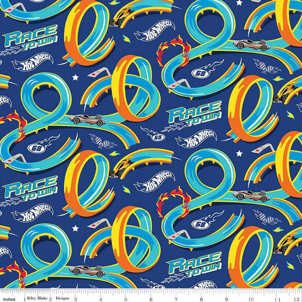 Image of the Hot Wheels Made to Race Track Navy quilting cotton fabric by Riley Blake Designs. Official licensed product. Territorial sales restrictions may apply. Features tracks and cars with text on a blue background.
Cute Little Fabric Shop