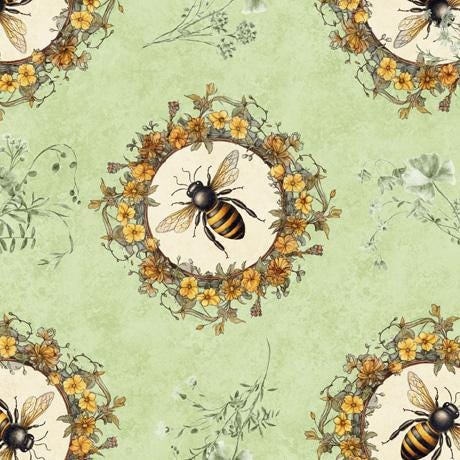 Image of the Queen Bee Bee Circle Vignette Light Sage quilting cotton fabric by QT Fabrics. Features bees with circles of flowers on a light green background. 
Cute Little Fabric Shop