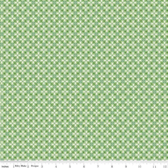 Image of the Farm Girl Vintage Vintage Green quilting cotton fabric by Lori Holt for Riley Blake Designs. Features a geometric print of repeating flower petals on a green background. 
Cute Little Fabric Shop
