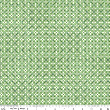 Image of the Farm Girl Vintage Vintage Green quilting cotton fabric by Lori Holt for Riley Blake Designs. Features a geometric print of repeating flower petals on a green background. 
Cute Little Fabric Shop
