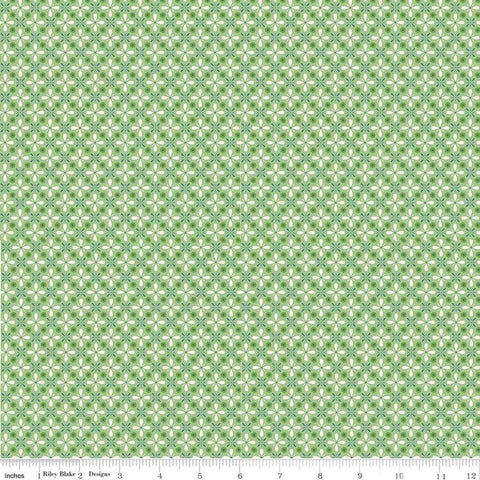 Image of the Farm Girl Vintage Vintage Green quilting cotton fabric by Lori Holt for Riley Blake Designs. Features a geometric print of repeating flower petals on a green background. 
Cute Little Fabric Shop