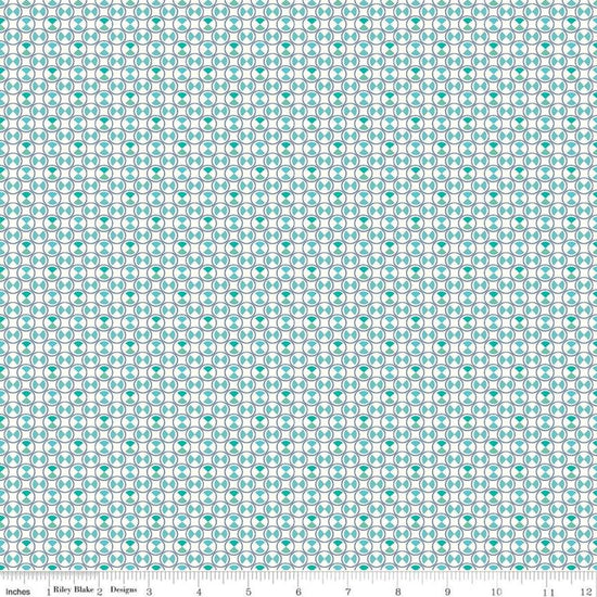 Image of the Vintage Happy 2 Boxers Blue quilting cotton fabric by Lori Holt for Riley Blake Designs. Features an hour-glass shape inside a circle on a light blue background.  
Cute Little Fabric Shop
