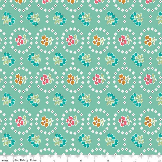 Image of the Granny Chic Curtains Teal quilting cotton fabric by Lori Holt for Riley Blake Designs. Features a flower bordered by a circle of small white flowers on a mint background. 
Cute Little Fabric Shop