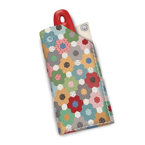 Image of the Leather Rotary Sheath Calico by Lori Holt for Riley Blake Designs. Features a case for your rotary blade. 
Cute Little Fabric Shop