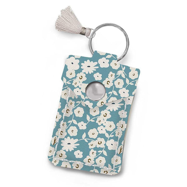 Image of the Leather Scissor Pouch Spring Gardens by Lori Holt for Riley Blake Designs. Features a blue case with white flowers on it. 
Cute Little Fabric Shop