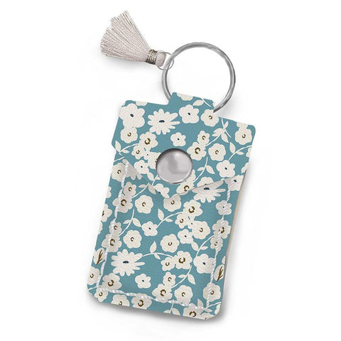 Image of the Leather Scissor Pouch Spring Gardens by Lori Holt for Riley Blake Designs. Features a blue case with white flowers on it. 
Cute Little Fabric Shop