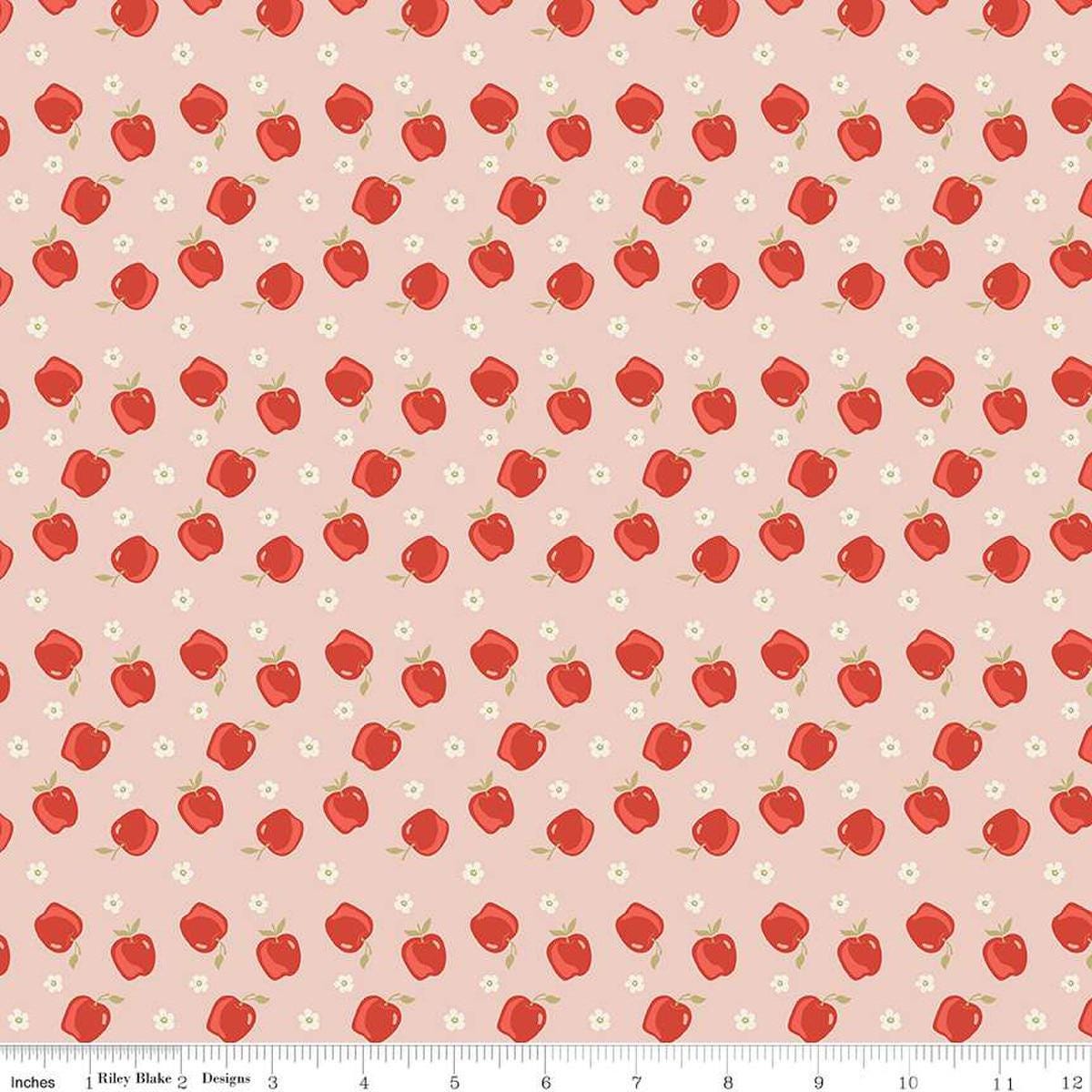 Image of the Vintage Charm Apples Blush quilting cotton fabric by Dani Mogstad for Riley Blake Designs. Features scattered apples and blossoms on a light pink background. 
Cute Little Fabric Shop