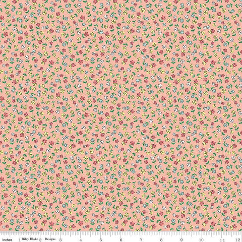 Image of the Playtime 30s Flowers Apricot quilting cotton fabric by Lindsay Wilkes for Riley Blake Designs. Features small scattered flowers on an peach pink background. 
Cute Little Fabric Shop