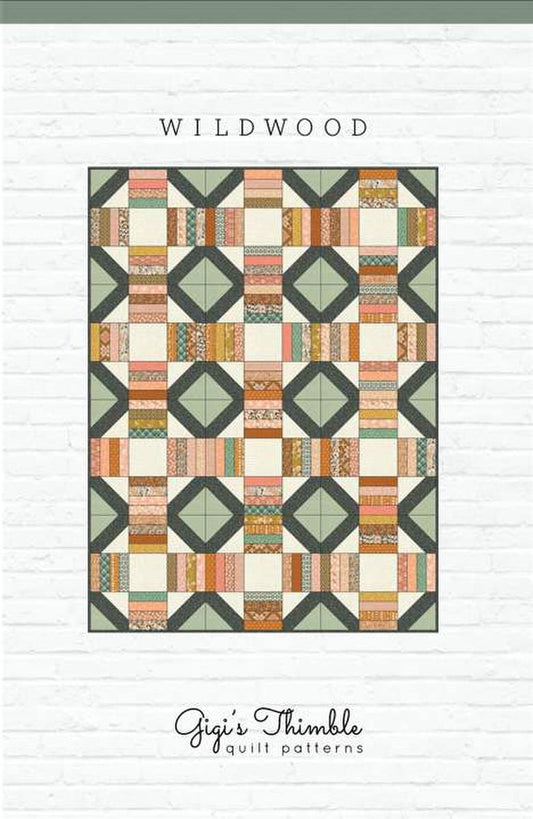 Image of the Wildwood pattern by Amber Johnson for Riley Blake Designs. Features striped lines and squares on the quilt. 
Cute Little Fabric Shop