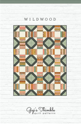 Image of the Wildwood pattern by Amber Johnson for Riley Blake Designs. Features striped lines and squares on the quilt. 
Cute Little Fabric Shop