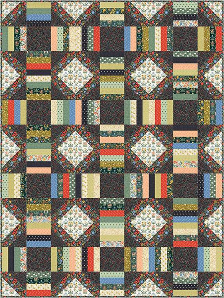 Image of the Wildwood pattern by Amber Johnson for Riley Blake Designs. Features striped lines and squares on the quilt. 
Cute Little Fabric Shop