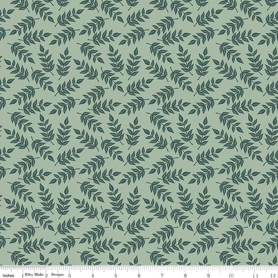Image of the Garden Dreams Leaves Sage quilting cotton fabric by Amber Elliot for Riley Blake Designs. Features leaves on a light green background. 
Cute Little Fabric Shop