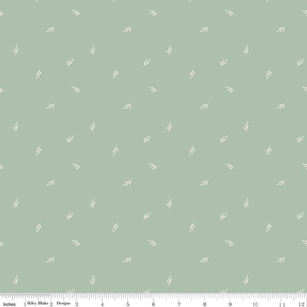 Image of the Garden Dreams Leaf Toss Sage quilting cotton fabric by Amber Elliot for Riley Blake Designs. Features leaves scattered on a light green background. 
Cute Little Fabric Shop