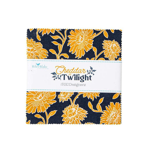 Image of the Cheddar at Twilight 5 inch stacker by The RBD Designers for Riley Blake Designs. Features floral fabrics and geometric patterns on orange, blue, and cream fabrics.
Cute Little Fabric Shop