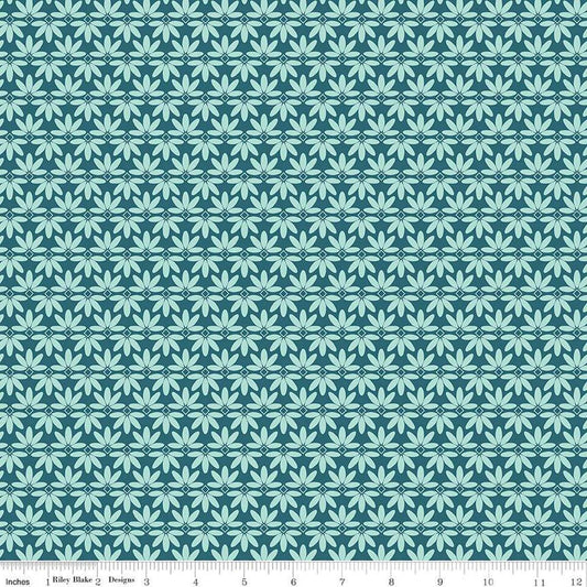 Image of the Melody Deco Leaves Colonial Blue quilting cotton fabric by Beverly McCullough for Riley Blake Designs. Features geometric green flowers on a dark blue background. 
Cute Little Fabric Shop