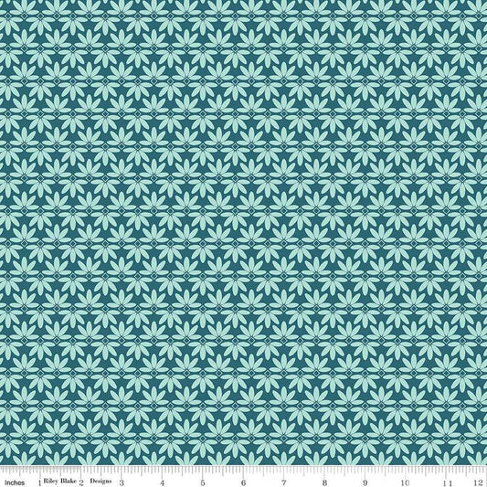 Image of the Melody Deco Leaves Colonial Blue quilting cotton fabric by Beverly McCullough for Riley Blake Designs. Features geometric green flowers on a dark blue background. 
Cute Little Fabric Shop