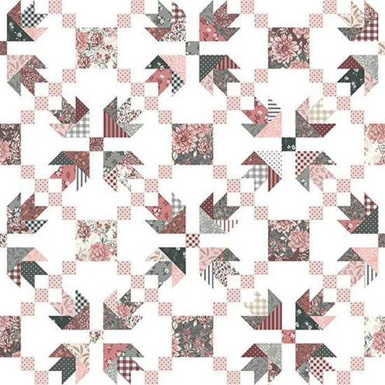 Image of the A Walk on the Prairie Prairie Chain Cheater White quilting cotton fabric by Modern Prairie for Riley Blake Designs. Features a tulip block designs with pink, grey, and cream fabrics. 
Cute Little Fabric Shop
