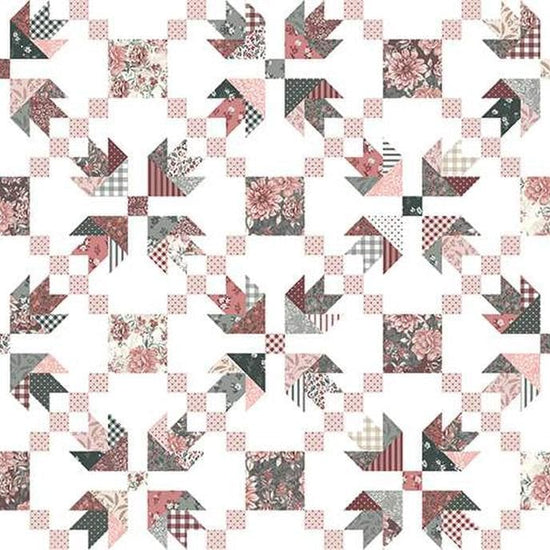 Image of the A Walk on the Prairie Prairie Chain Cheater White quilting cotton fabric by Modern Prairie for Riley Blake Designs. Features a tulip block designs with pink, grey, and cream fabrics. 
Cute Little Fabric Shop