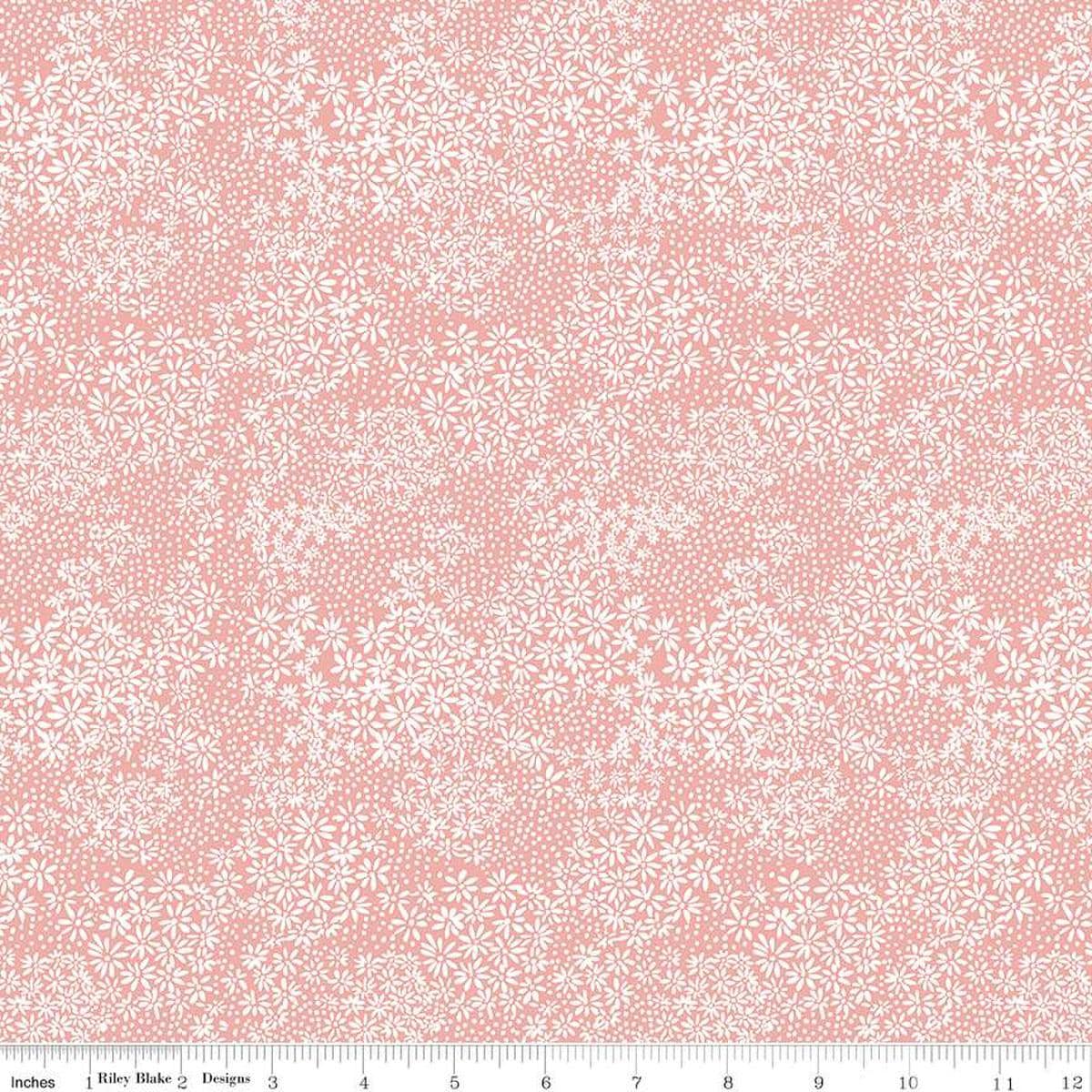 Image of the A Walk on the Prairie Silhouette Coral quilting cotton fabric by Modern Prairie for Riley Blake Designs. Features small flowers and dots on a light pink background.
Cute Little Fabric Shop