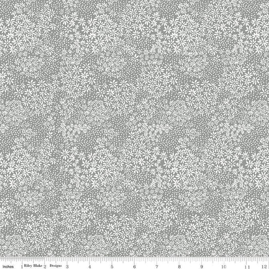 Image of the A Walk on the Prairie Silhouette Sage Gray quilting cotton fabric by Modern Prairie for Riley Blake Designs. Features small flowers and dots on a grey background.
Cute Little Fabric Shop