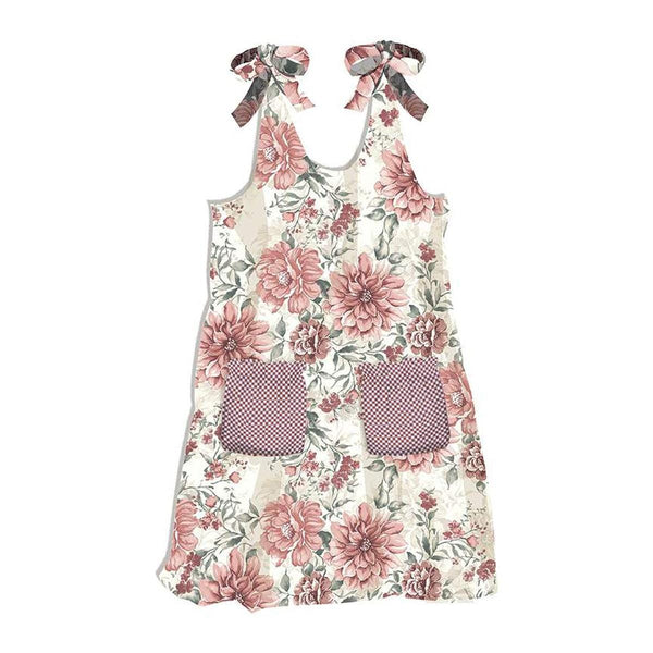 Image of the A Walk on the Prairie Prairie Pinafore Home Decor Panel Cream light weight canvas fabric by Modern Prairie for Riley Blake Designs. Features an apron with flowers on cream fabric. 
Cute Little Fabric Shop