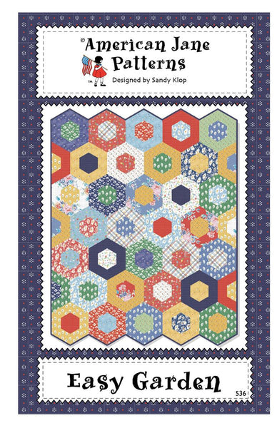 Image of the Easy Garden quilt pattern by American Jane for Riley Blake Designs. Features hexagons on a quilt. 
Cute Little Fabric Shop