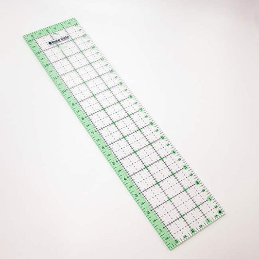 Image of the Lori Holt Cute Cuts™ Ruler 3 1/2" x 14 1/2" by Lori Holt for Riley Blake Designs. Features a ruler with green. 
Cute Little Fabric Shop